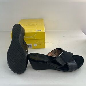 Circa Joan and David Luxe Series black patent leather and wedged.
